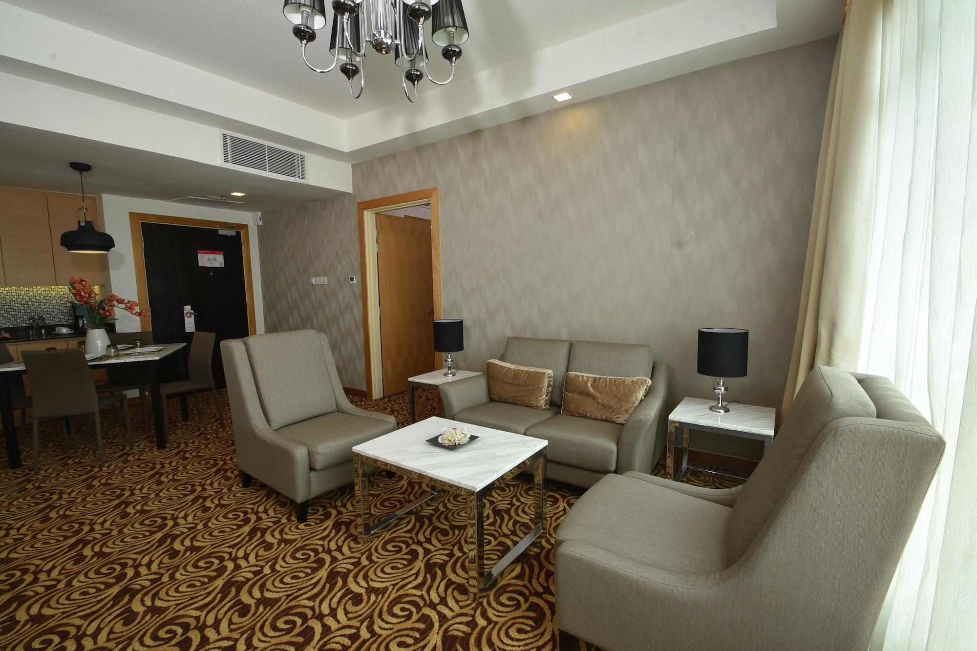 Tenera Hotel Bangi Esterno foto A living room in a suite at the hotel